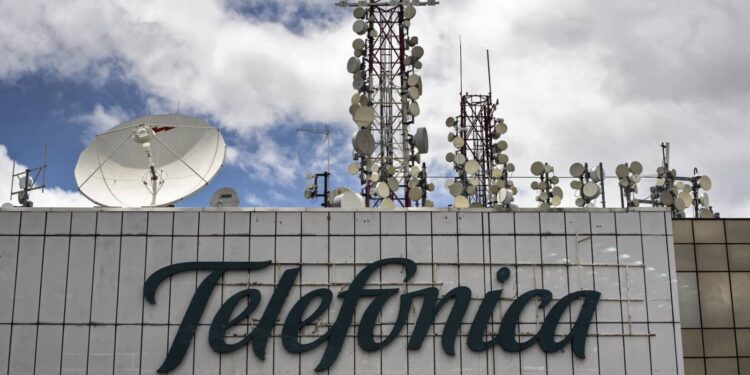 Picture of antennas on the roof of Spanish telecoms giant Telefonica tower in Caracas, taken on June 6, 2022. (Photo by Yuri CORTEZ / AFP)