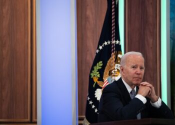 President Biden listens to a speaker at the Major Economies Forum on Energy and Climate in the White House complex Thursday. (Elizabeth Frantz/For The Washington Post)