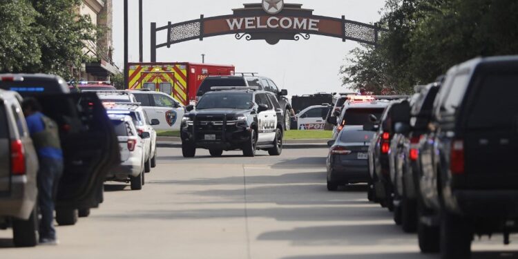 ALLEN, TEXAS - MAY 6: Emergency vehicles line the entrance to the Allen Premium Outlets where a shooting took place on May 6, 2023 in Allen, Texas. According to reports, a shooter opened fire at the outlet mall, injuring at least nine people who were taken to local hospitals. The police have confirmed there were fatalities but have not specified how many. The unidentified shooter was neutralized by an Allen Police officer responding to an unrelated call.   Stewart F. House/Getty Images/AFP (Photo by Stewart F. House / GETTY IMAGES NORTH AMERICA / Getty Images via AFP)