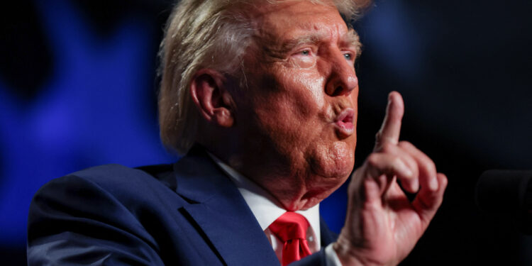 Former U.S. President and Republican candidate Donald Trump makes a keynote speech at a Republican fundraising dinner in Columbia, South Carolina, U.S. August 5, 2023.  REUTERS/Sam Wolfe