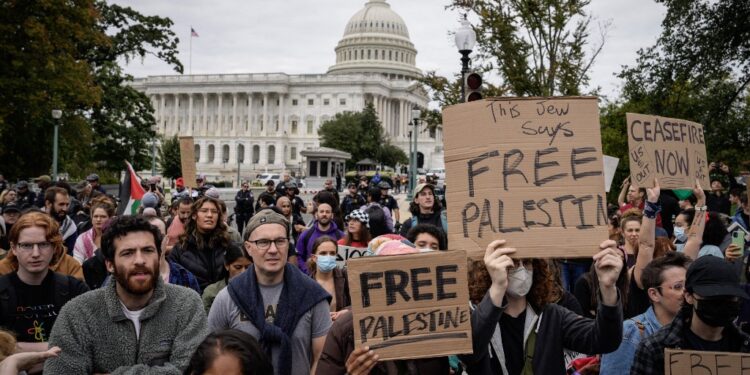 WASHINGTON, DC - OCTOBER 18: Demonstrators rally to demand a cease-fire against Palestinians in Gaza on Independence Avenue near the U.S. Capitol October 18, 2023 in Washington, DC. Organized by Jewish Voice for Peace and IfNotNow, hundreds of demonstrators were arrested for holding a rally inside the Cannon House office building.   Drew Angerer/Getty Images/AFP (Photo by Drew Angerer / GETTY IMAGES NORTH AMERICA / Getty Images via AFP)