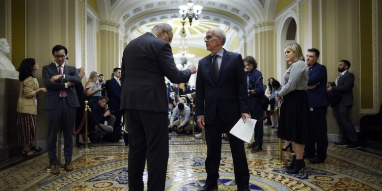 WASHINGTON, DC - NOVEMBER 07: Senate Majority Leader Charles Schumer (D-NY) talks to Sen. Peter Welch (D-VT) during a news conference following the weekly Senate Democratic policy luncheon at the U.S. Capitol on November 07, 2023 in Washington, DC. Schumer and his fellow Democratic Senators voiced their opposition to legislation put forward by Republicans to attach immigration reform to funding for the wars in Ukraine and Israel.   Chip Somodevilla/Getty Images/AFP (Photo by CHIP SOMODEVILLA / GETTY IMAGES NORTH AMERICA / Getty Images via AFP)