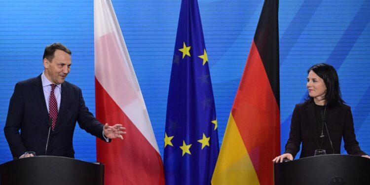 German Foreign Minister Annalena Baerbock and Poland's Foreign Minister Radoslaw Sikorski hold a joint a press conference in Berlin on January 30, 2024. (Photo by JOHN MACDOUGALL / AFP)