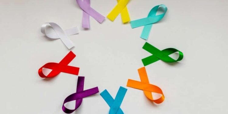 circle with colored ribbons of disease prevention campaigns