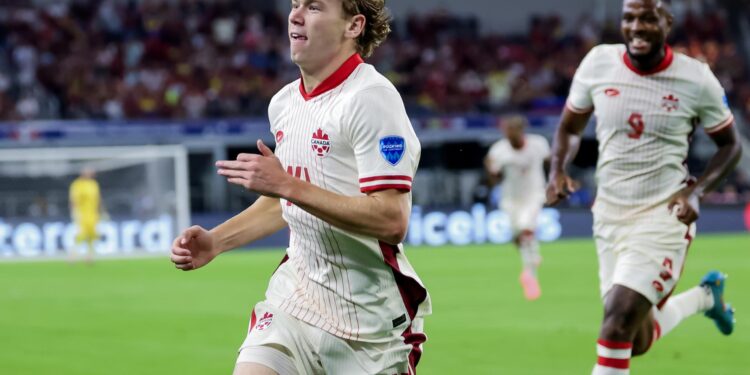 Arlington (United States), 06/07/2024.- Jacob Shaffelburg (L) of Canada reacts after scoring the opening 1-0 goal against Venezuela during the first half of the CONMEBOL Copa America 2024 Quarter-finals match between Venezuela and Canada, in Arlington, Texas, USA, 05 July 2024. EFE/EPA/KEVIN JAIRAJ