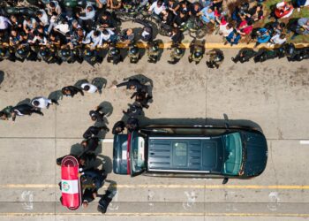 The coffin of late Peru's former president Alberto Fujimori arrives for his wake at the Culture Ministry in Lima on September 12, 2024. - Peru's former president Alberto Fujimori, who ruled his country with an iron fist and then spent 16 years in prison for crimes against humanity, died on Wednesday at age 86 in the capital Lima. (Photo by Juan Carlos CISNEROS / AFP)