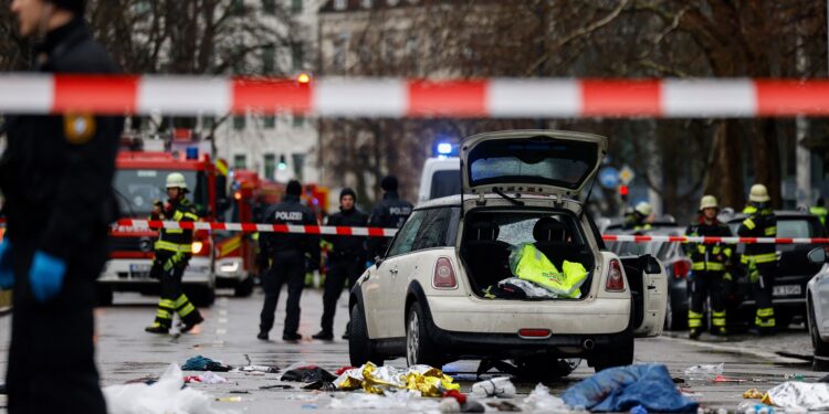 Members of the emergency services work at the scene where a car drove into a crowd in the southern German city of Munich on February 13, 2025 leaving several people injured, police said. Munich police said on social media platform X that "several people were injured" after "a car drove into a group of people" in the centre of the Bavarian state capital. (Photo by Michaela STACHE / AFP)