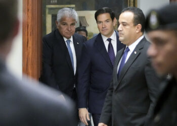 Panama's President Jose Raul Mulino (L) and US Secretary of State Marco Rubio arrive for a meeting at the presidential palace in Panama City on February 2, 2025. Rubio arrived on the eve on his debut trip abroad as US secretary of state, as he looks for how to follow up on President Donald Trump's extraordinary threat to seize the Panama Canal. (Photo by Mark Schiefelbein / POOL / AFP)