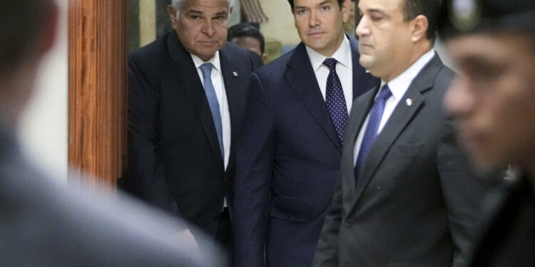 Panama's President Jose Raul Mulino (L) and US Secretary of State Marco Rubio arrive for a meeting at the presidential palace in Panama City on February 2, 2025. Rubio arrived on the eve on his debut trip abroad as US secretary of state, as he looks for how to follow up on President Donald Trump's extraordinary threat to seize the Panama Canal. (Photo by Mark Schiefelbein / POOL / AFP)