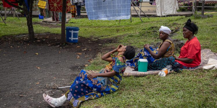 GOMA (DEMOCRATIC REPUBLIC OF CONGO), 05/02/2025.- A patient wounded during fighting between the Armed Forces of the Democratic Republic of the Congo (FARDC) and the M23 rebels sits outside Kyeshero Hospital in Goma, North Kivu, Democratic Republic of Congo, 05 February 2025. Goma, captured by the rebels from the M23, is in the midst of a ceasefire after several hundred people have reportedly been killed in the hostilities between the (FARDC) and the M23. (Ruanda) EFE/EPA/MARIE JEANNE MUNYERENKANA